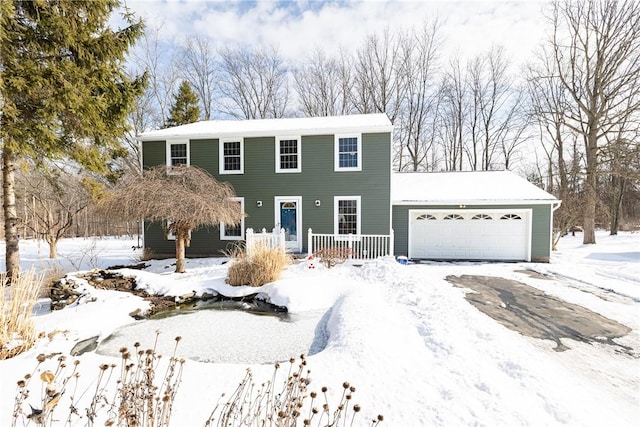 view of front of property featuring a garage