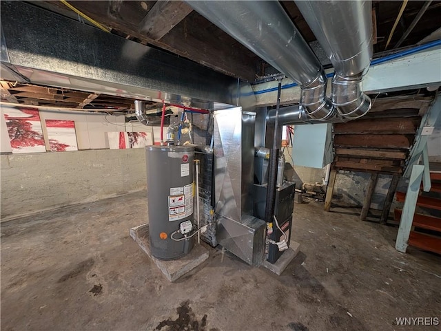 utility room featuring heating unit and water heater