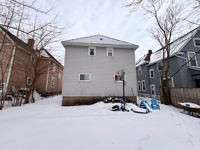 view of snow covered property