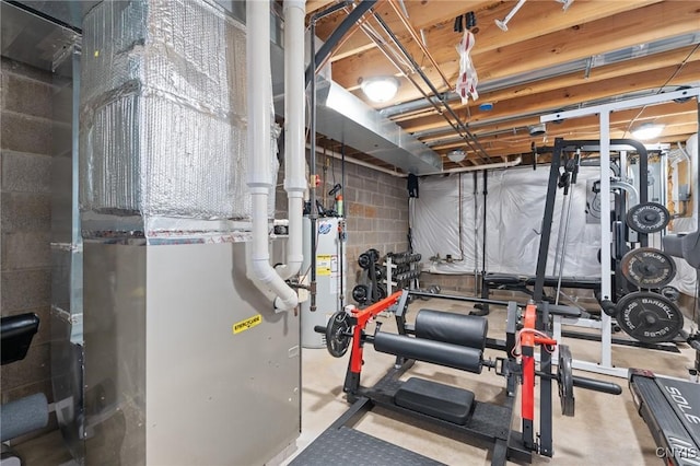 exercise room with water heater and heating unit