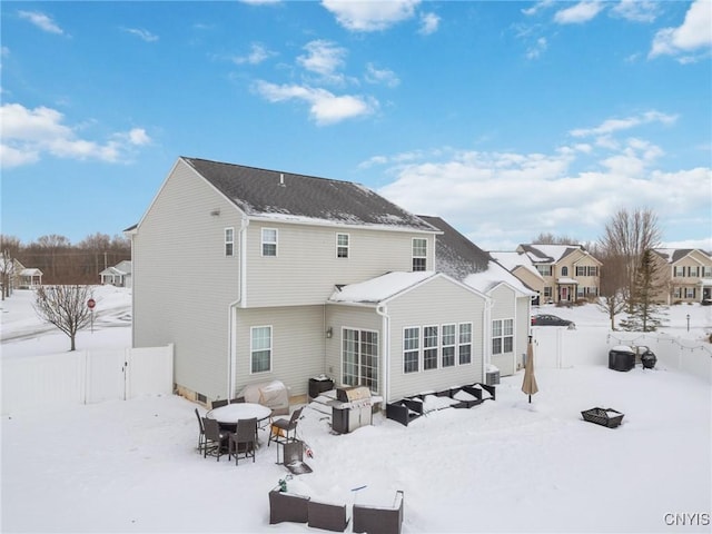 view of snow covered house