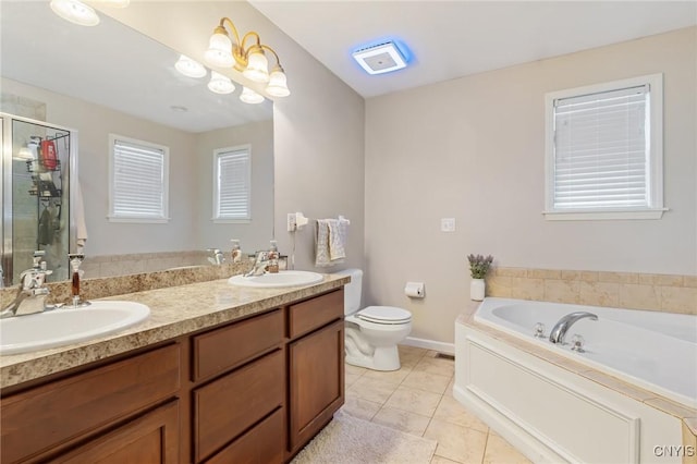 full bathroom with tile patterned floors, toilet, independent shower and bath, and vanity