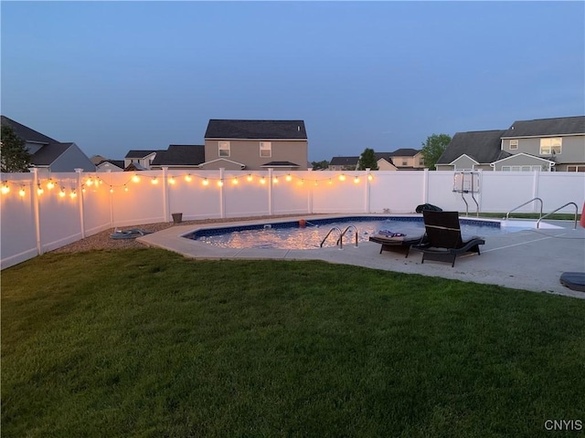 exterior space with a patio area and a lawn