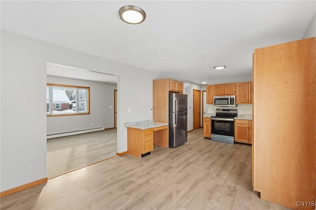 kitchen featuring stainless steel appliances, light stone counters, baseboard heating, and light hardwood / wood-style floors