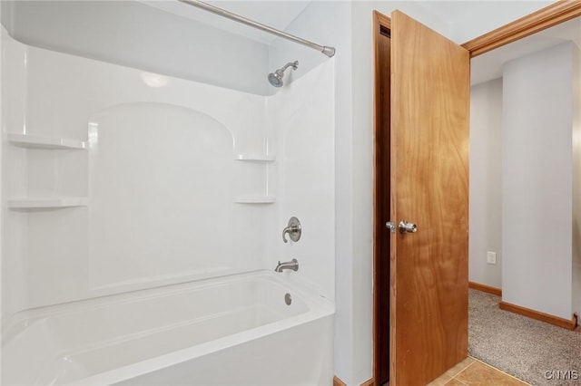 bathroom featuring tile patterned flooring and shower / bathing tub combination