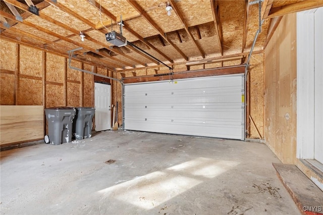 garage featuring a garage door opener