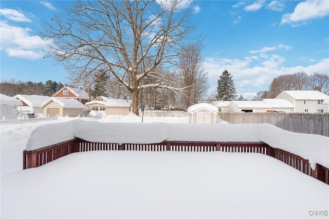 view of yard covered in snow