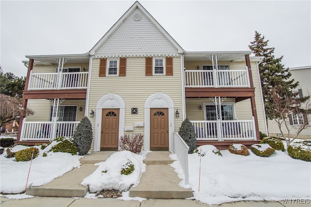 view of front of property with a balcony