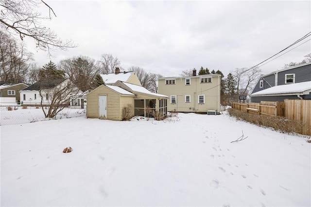 view of snow covered property