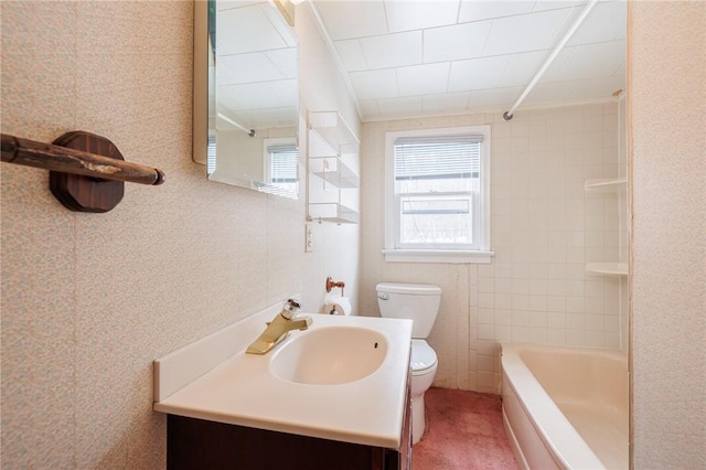 full bathroom with shower / tub combination, vanity, and toilet