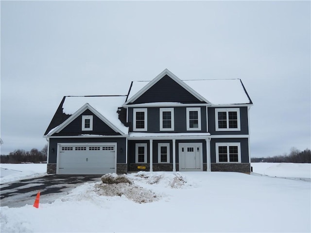 view of front of property with a garage