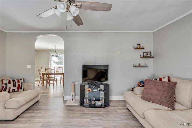 11190 US Route 11, Adams, NY 13605 - living room with ceiling fan, ornamental molding, and light hardwood / wood-style flooring