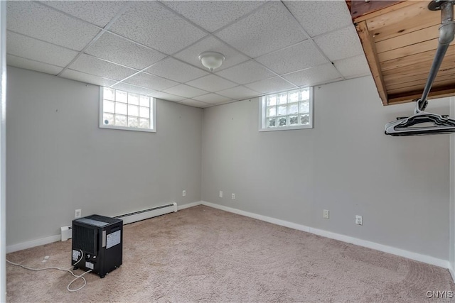 11190 US Route 11, Adams, NY 13605 - basement with a baseboard radiator, carpet floors, and a drop ceiling