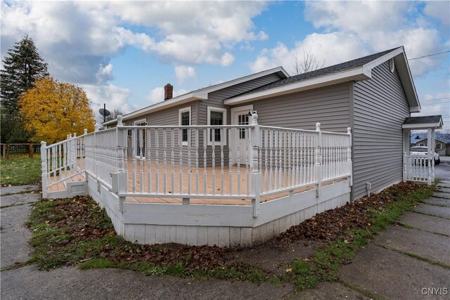 11190 US Route 11, Adams, NY 13605 - rear view of house featuring a deck and a chimney
