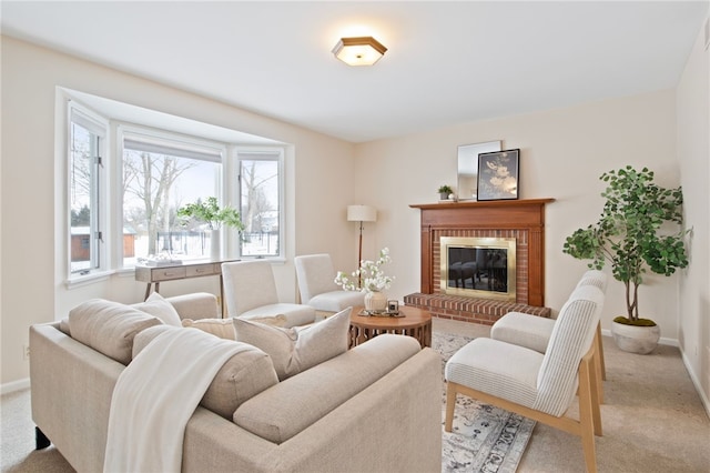 living room featuring light colored carpet and a fireplace