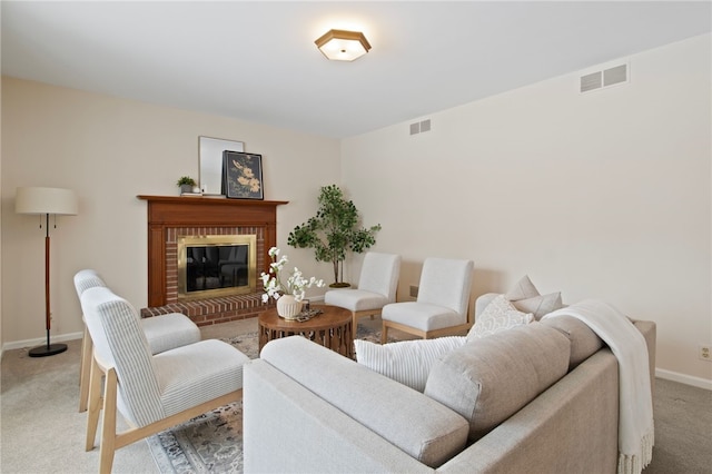 carpeted living room with a fireplace