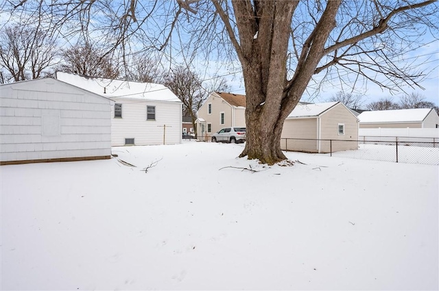 view of yard covered in snow