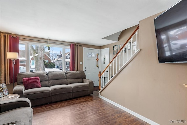 living room featuring dark wood-type flooring