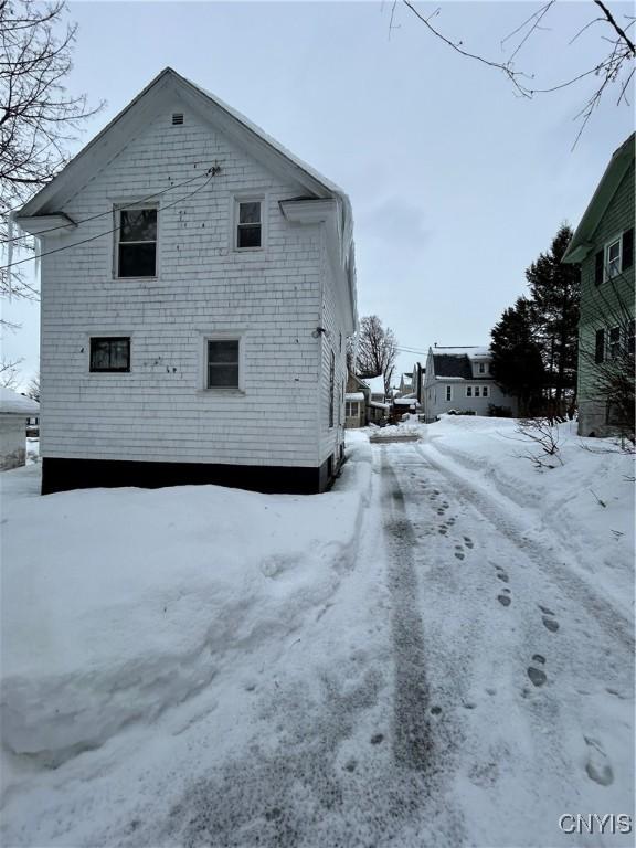 view of snow covered property