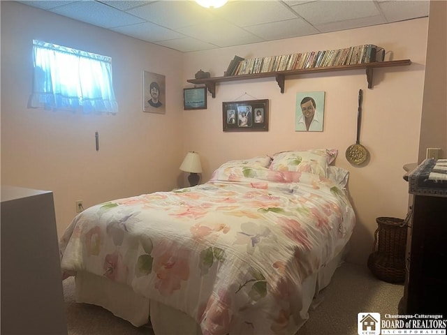 bedroom featuring a drop ceiling