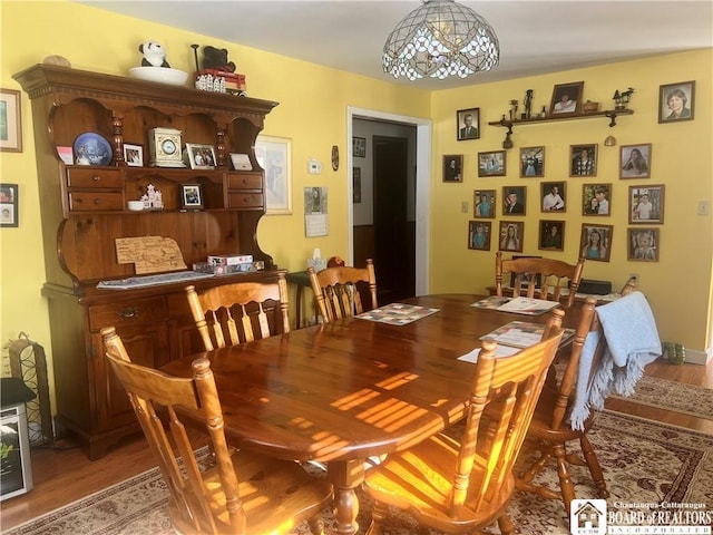 dining space featuring light hardwood / wood-style flooring