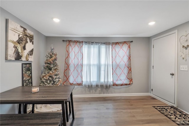 dining room with hardwood / wood-style floors