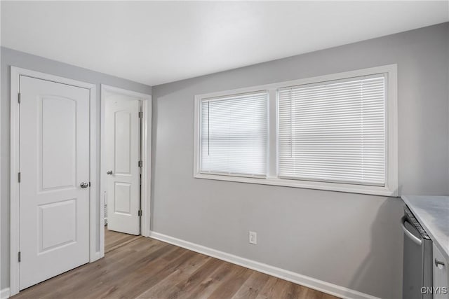 unfurnished bedroom featuring light wood-type flooring