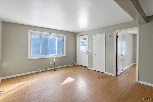 foyer entrance featuring light hardwood / wood-style flooring