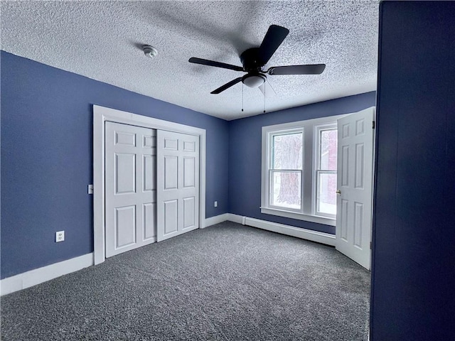 unfurnished bedroom featuring ceiling fan, carpet flooring, a closet, and a textured ceiling