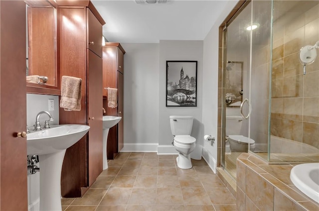 full bathroom featuring sink, toilet, separate shower and tub, and tile patterned flooring