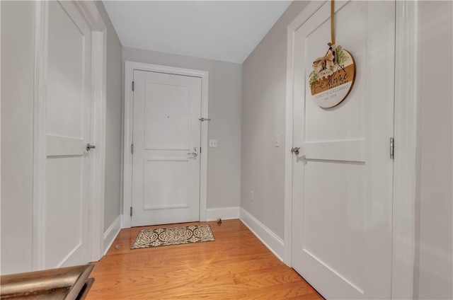 doorway to outside featuring light hardwood / wood-style floors