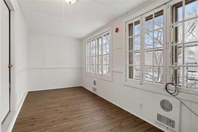 empty room with dark hardwood / wood-style floors