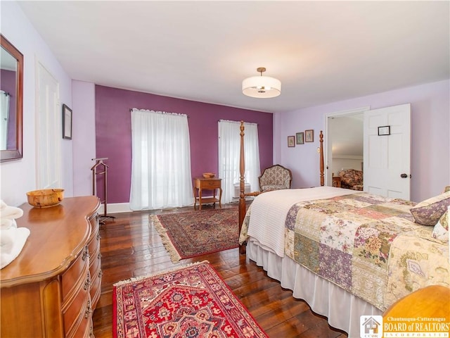 bedroom featuring dark hardwood / wood-style floors