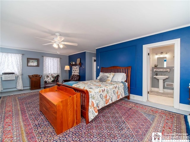 bedroom with ceiling fan, ornamental molding, and ensuite bathroom