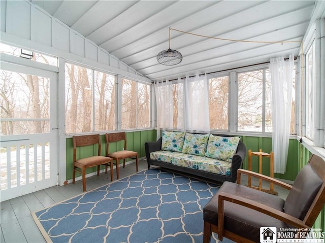 sunroom with vaulted ceiling