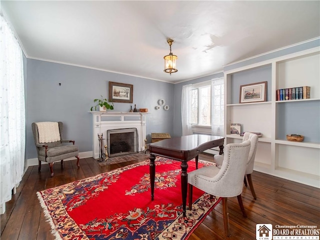 home office featuring crown molding and dark wood-type flooring