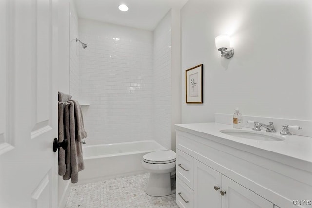 full bathroom featuring toilet, bathtub / shower combination, and vanity