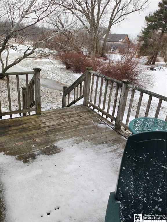 view of snow covered deck