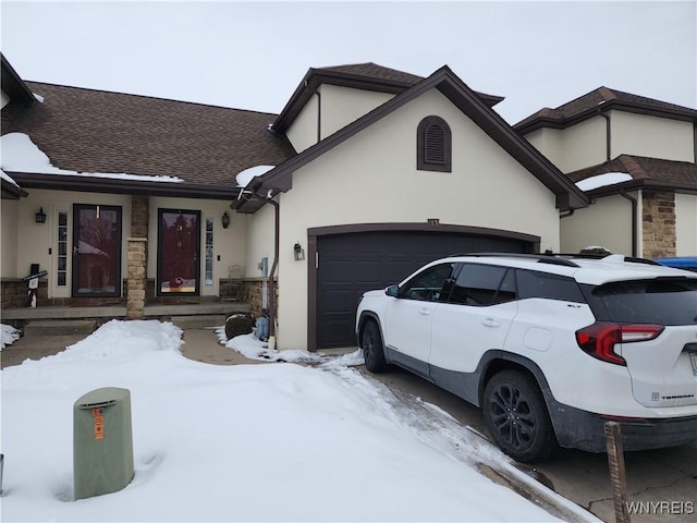 view of front of property with a garage