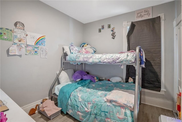 bedroom featuring hardwood / wood-style floors