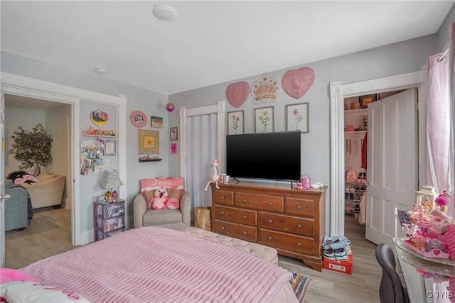 bedroom featuring light wood-type flooring