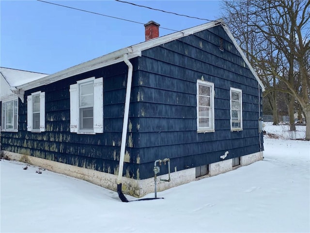 view of snow covered property