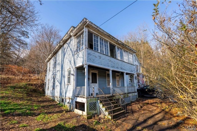 view of front of property featuring covered porch