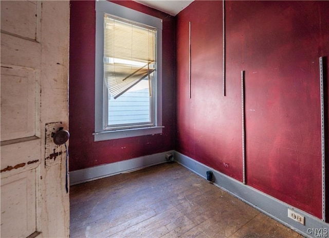 empty room featuring hardwood / wood-style flooring