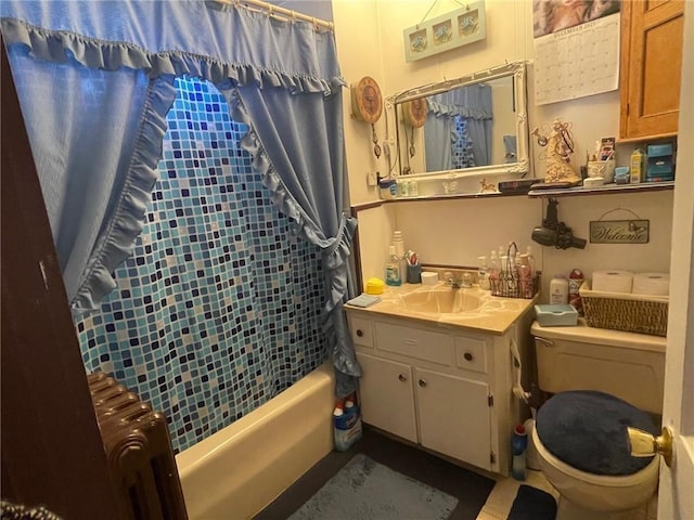 full bathroom with vanity, radiator heating unit, toilet, and shower / bath combo with shower curtain