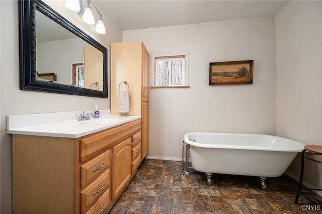 bathroom featuring vanity and a bathing tub