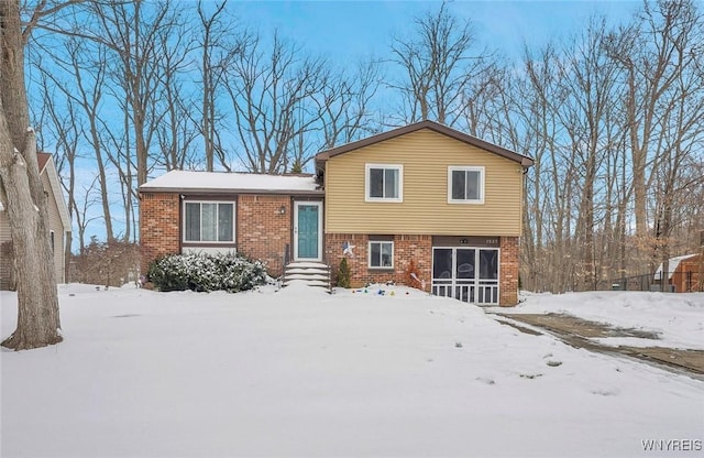 split level home featuring a garage