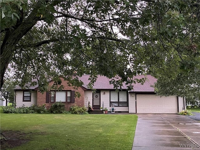 single story home featuring a garage and a front yard