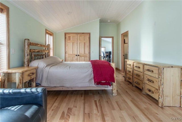 38908/912 Bartlett Point Rd Unit 912, Clayton, NY 13624 - bedroom with lofted ceiling, light wood-style flooring, a closet, and wood ceiling