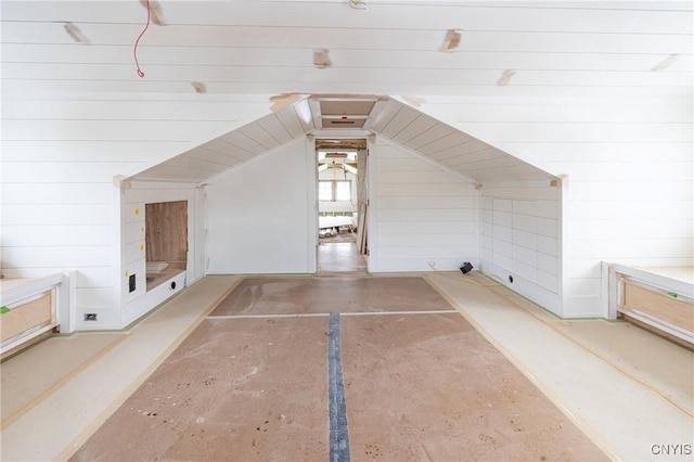 additional living space with vaulted ceiling